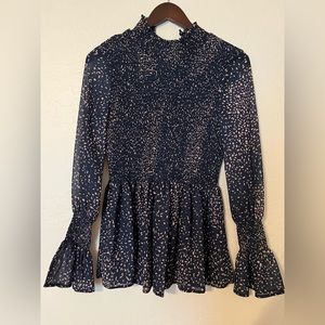 NEW! Navy smocked peplum with mock neck
